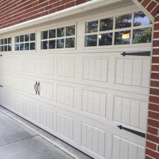 Classic Charm Meets Modern Convenience: CHI Overhead Stamped Carriage House Doors in Gulf Breeze, FL